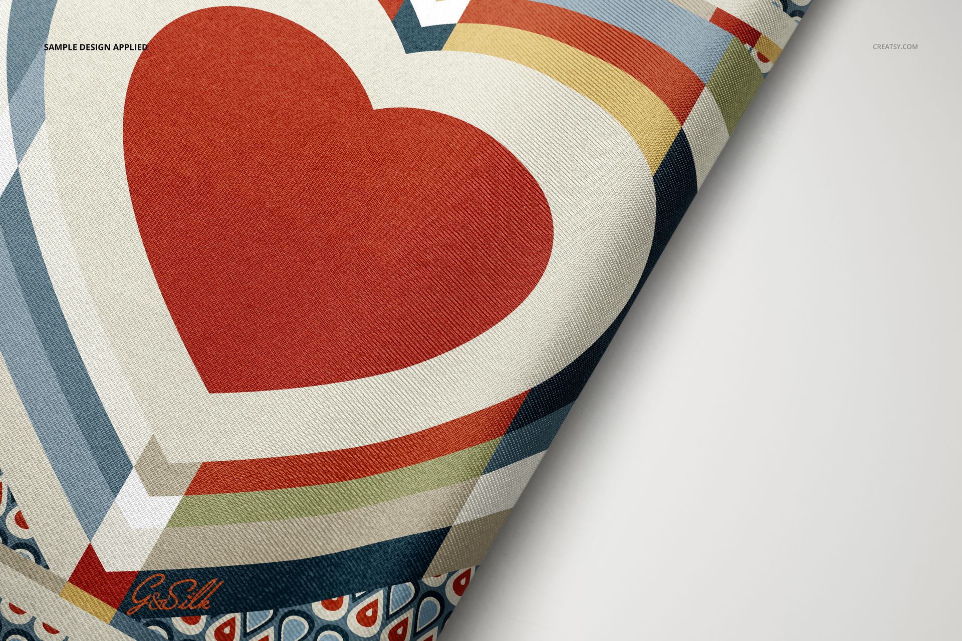 Fashion accessory mockup featuring a pocket square with colorful stripes and a large red heart, displayed on a light background.