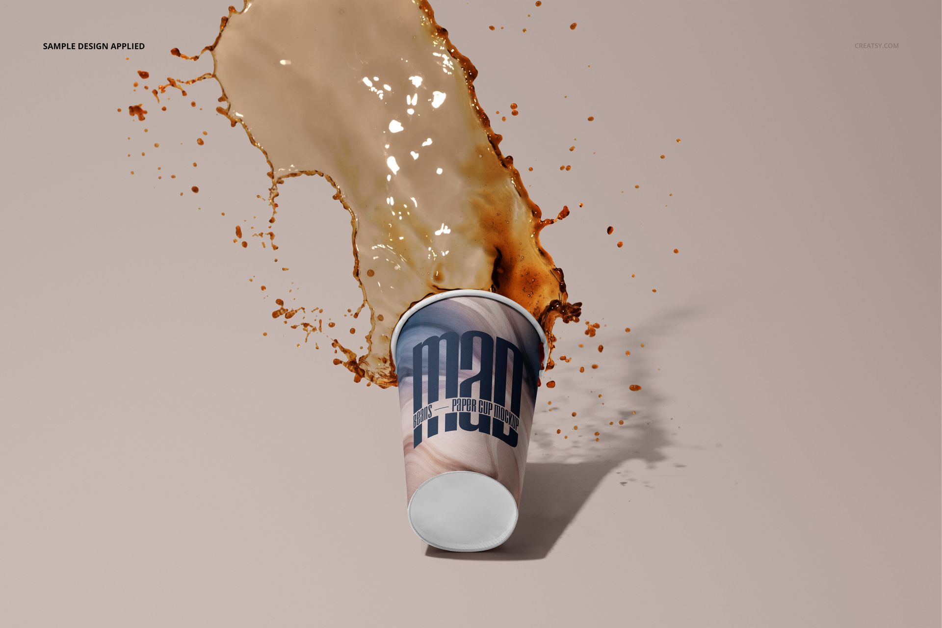 PSD mockup of a paper cup in motion, coffee spilling dramatically, modern design visible, soft lighting and shadows.
