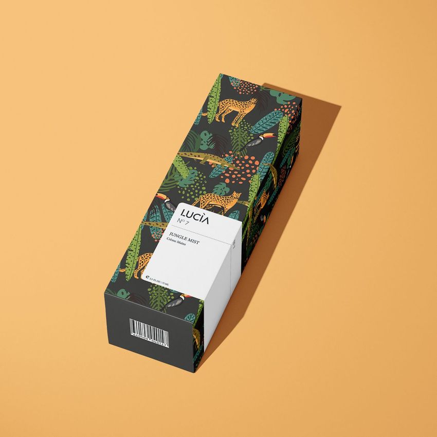 Tall box mockup featuring a jungle-themed pattern with leopards and foliage, placed on a solid light orange background.