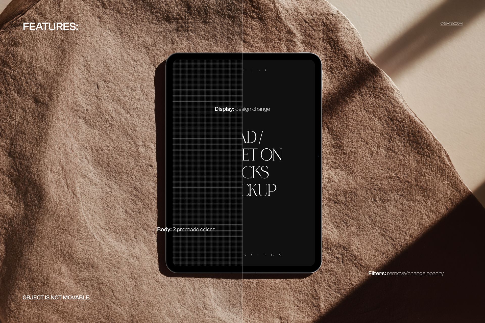 Top view of an iPad Pro mockup resting on light brown rocks, featuring a split screen design and shadows.