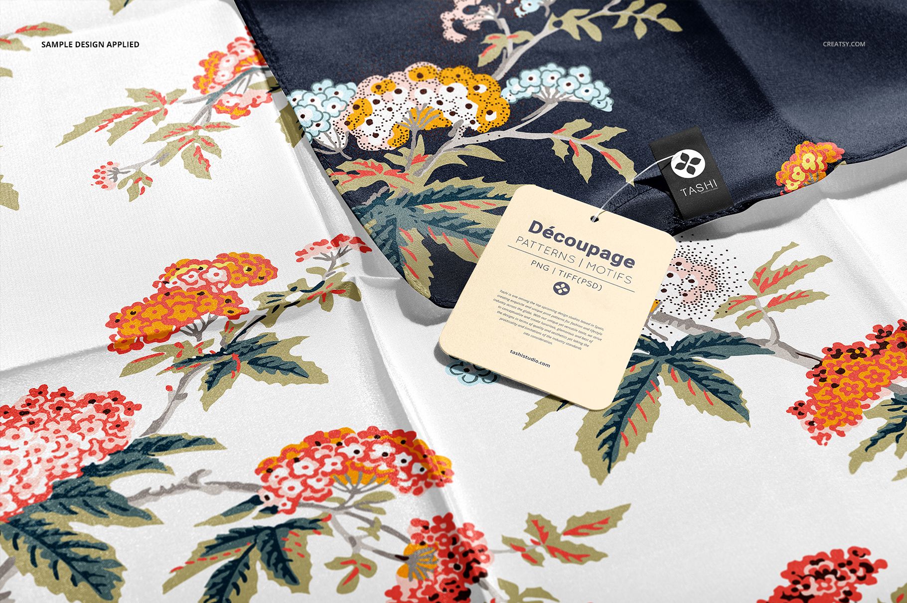 Top view of silk scarf mockups featuring intricate botanical designs and a beige product tag in the center.