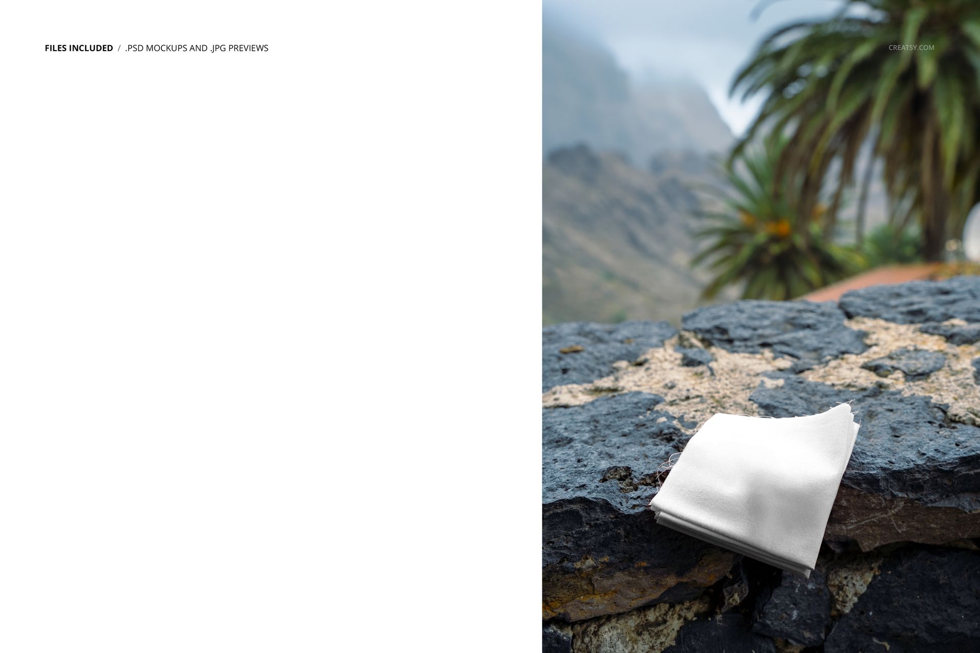 PSD mockup showing a stack of plain white fabric placed on a rugged rock surface, tropical landscape behind.