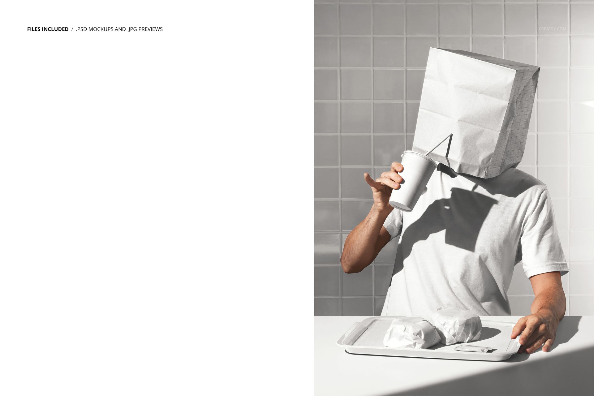 PSD mockup showing a man in a white t-shirt and paper bag mask, eating fast food at a table with a tiled wall background.