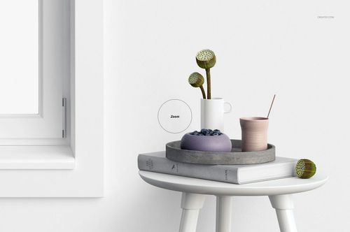 Front view of a white window with valance and cafe curtains mockup, next to a round table holding books, a bowl, and vases.