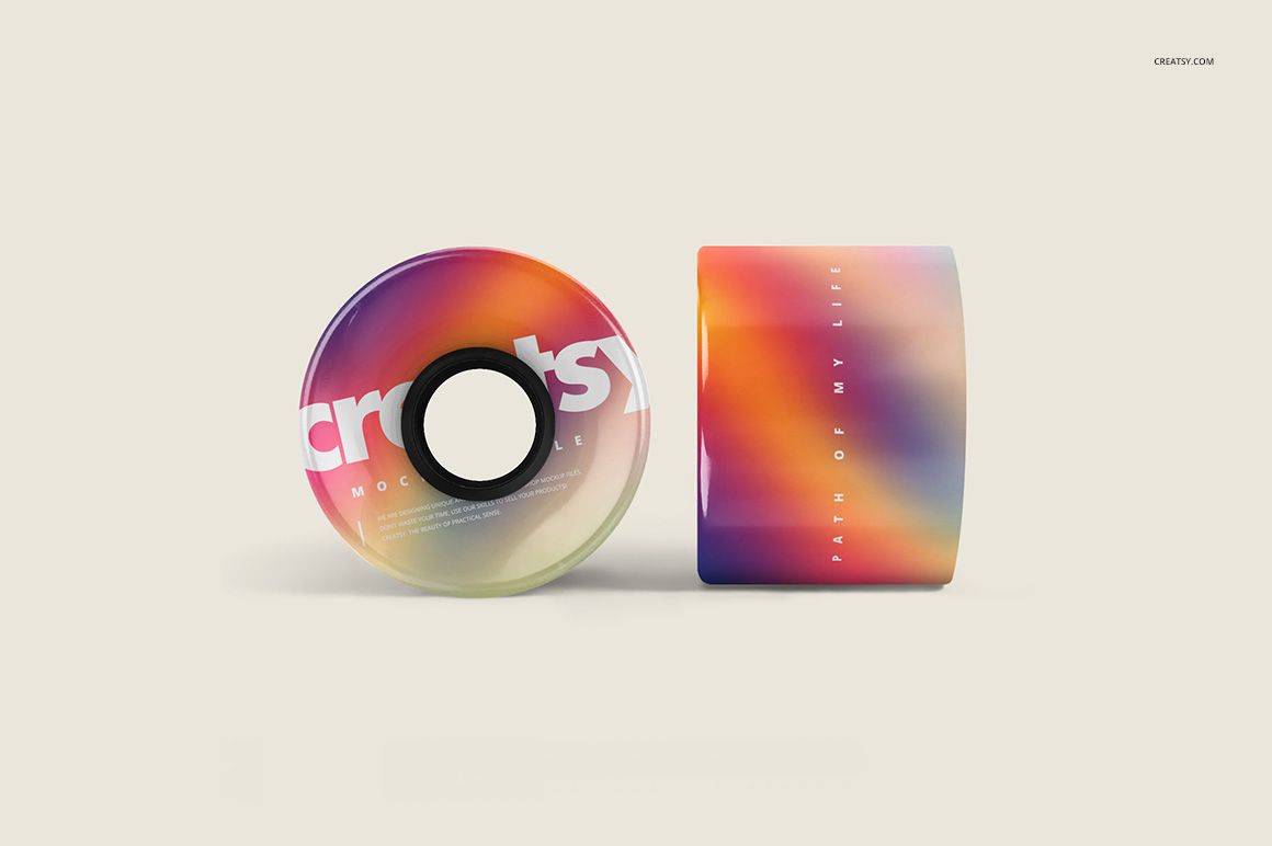 PSD mockup of penny skateboard wheels, featuring a multicolor gradient pattern on a neutral background, front and side angles.