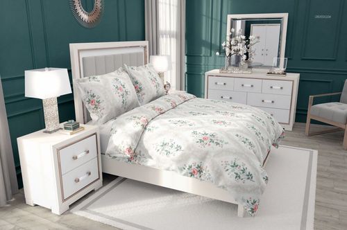 PSD mockup of a bedroom scene with a floral bedding set, flanged pillows, white nightstands, and elegant decor.