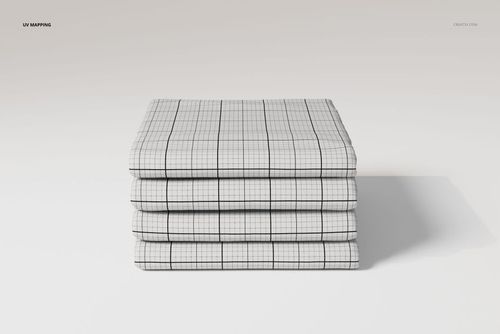 Folded cotton flat sheets stacked in a neat pile, featuring a white surface with a black grid pattern, front view.