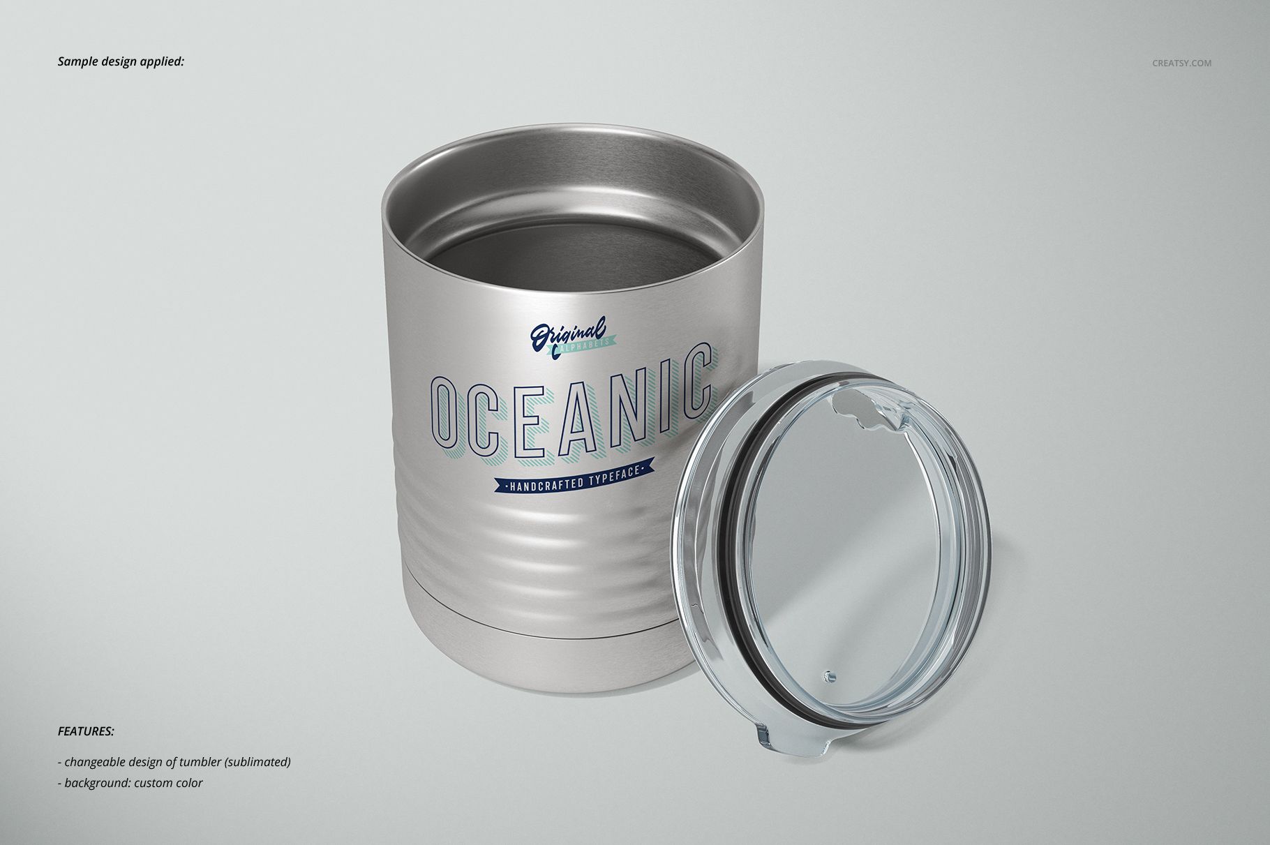 Mockup of a ringneck vacuum insulated tumbler with metallic finish and removable transparent lid on a plain surface.