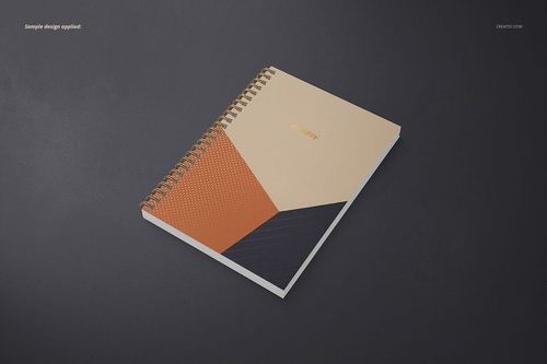 Front view of an A5 spiral notebook mockup with square holes, showing a modern geometric pattern in warm colors.