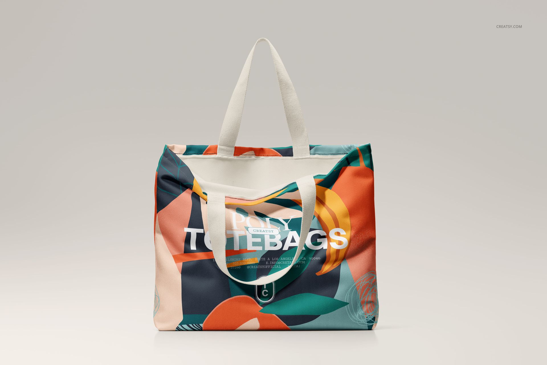 Front-facing PSD mockup of a spacious canvas tote bag with vibrant geometric design and white straps on neutral backdrop.