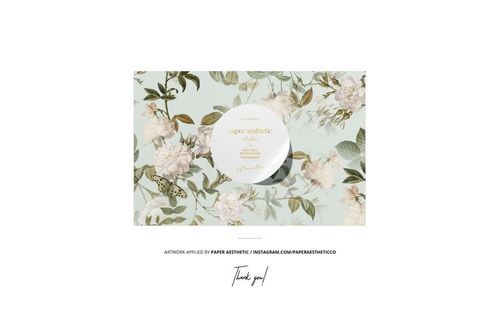 Top view close-up of fabric with a floral and leaf pattern in soft green and beige tones, shown as a PSD mockup.