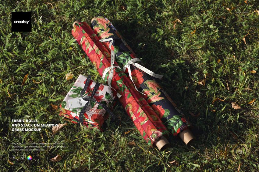 Fabric Rolls and Stack on Meadow Grass Mockup - mockup screenshot 1