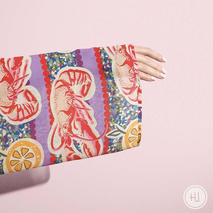 Chiffon kimono mockup featuring a close-up of a sleeve with a colorful lobster and lemon pattern against a pink background.