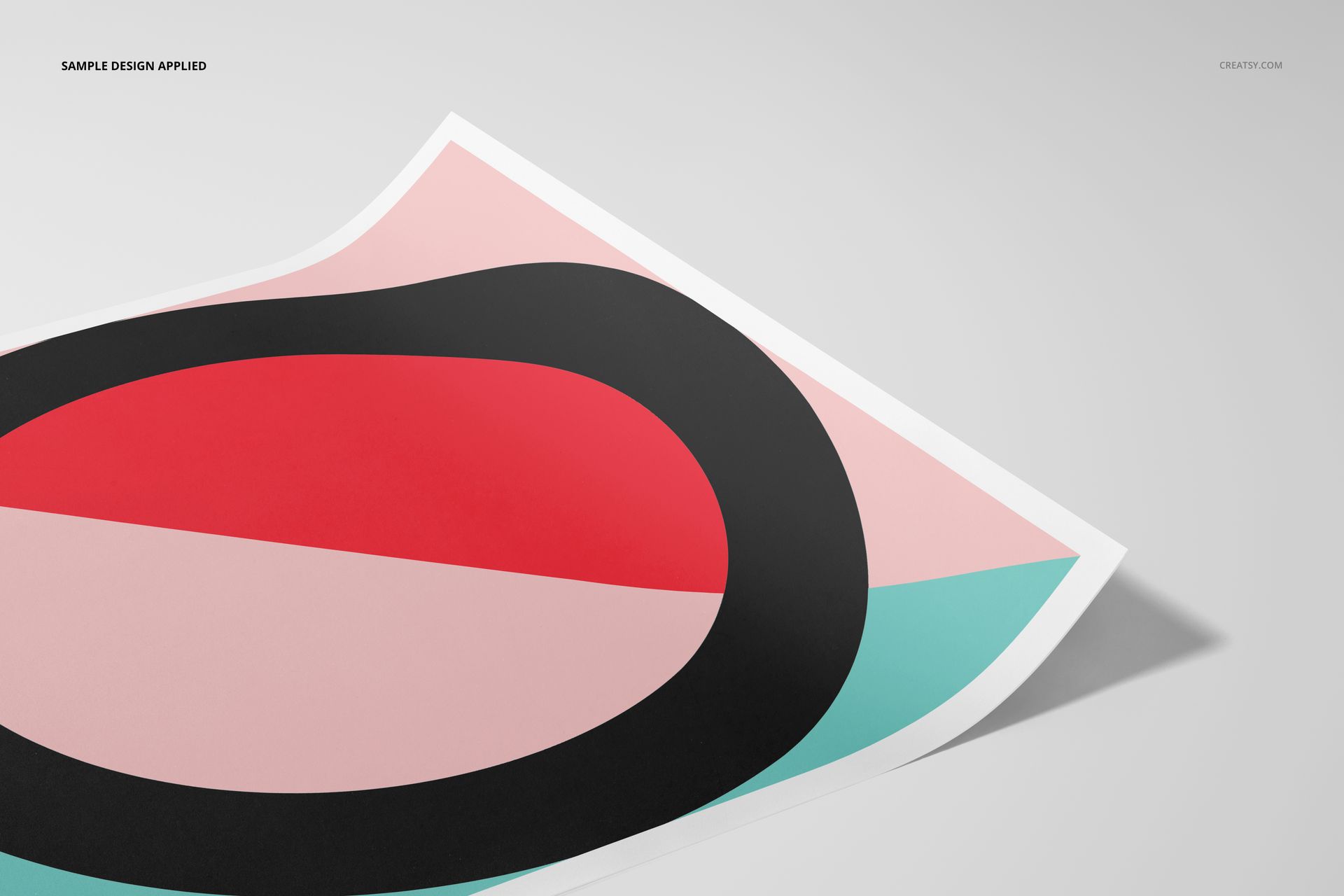 A3 fine art print mockup featuring an abstract geometric design in black, red, pink, and teal on a white sheet, angled on a light surface.