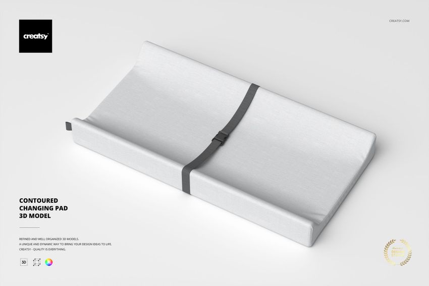 Contoured changing pad in light gray fabric, shown from an angled top view with a central safety strap attached.