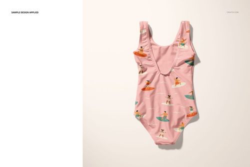 Front view of a baby swimsuit mockup featuring a pink fabric with playful surfing dog illustrations on a neutral background.