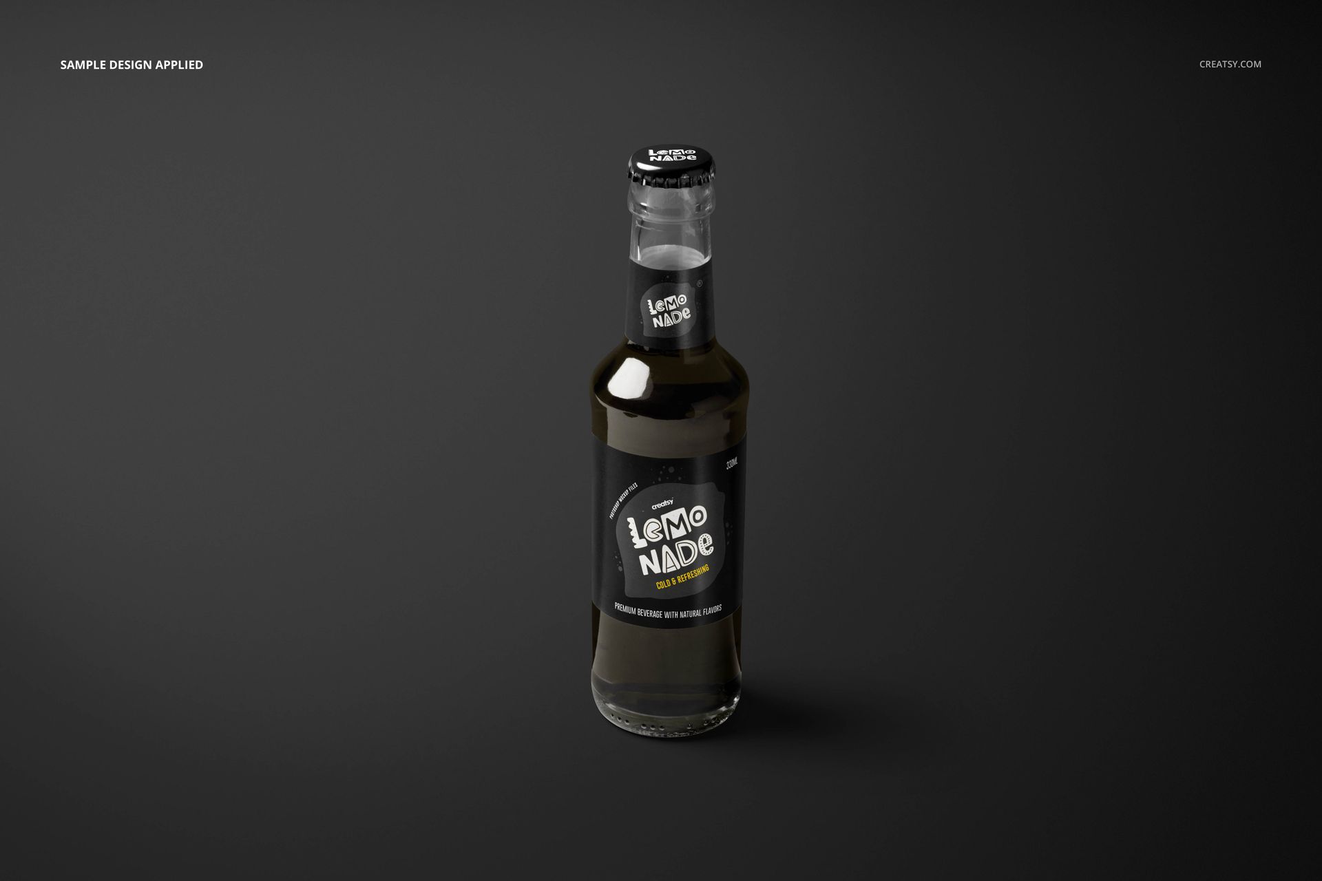 Lemonade glass bottle mockup featuring a cylindrical shape, black label design, and black bottle cap on a gray surface.
