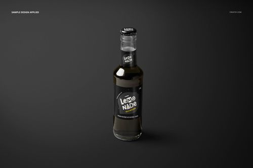 Lemonade glass bottle mockup featuring a cylindrical shape, black label design, and black bottle cap on a gray surface.