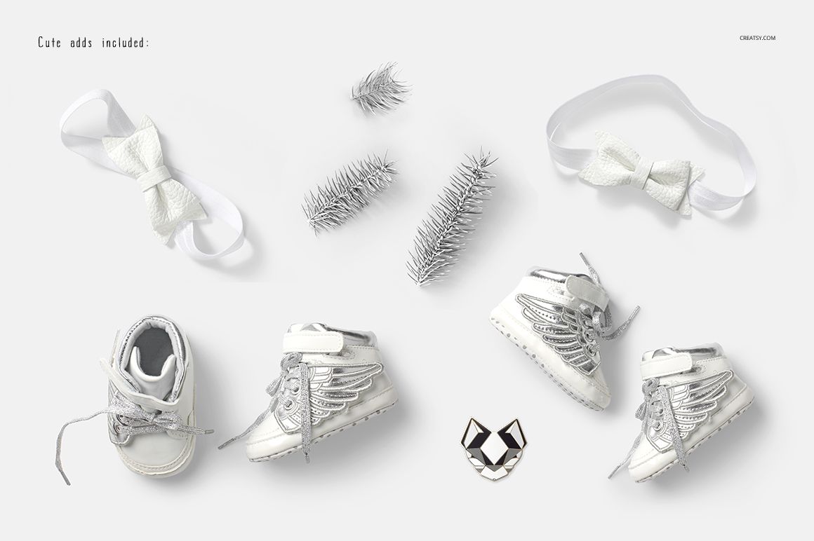 Baby sweatshirt mockup set featuring a heather gray sweatshirt, silver shoes, bows, and pine branches on a light background.