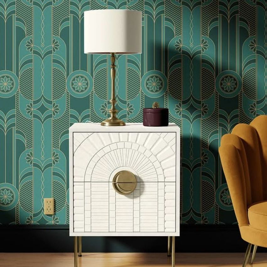 Drum lamp shade mockup displayed on a brass lamp atop a white geometric cabinet, set against a teal art deco wallpaper.