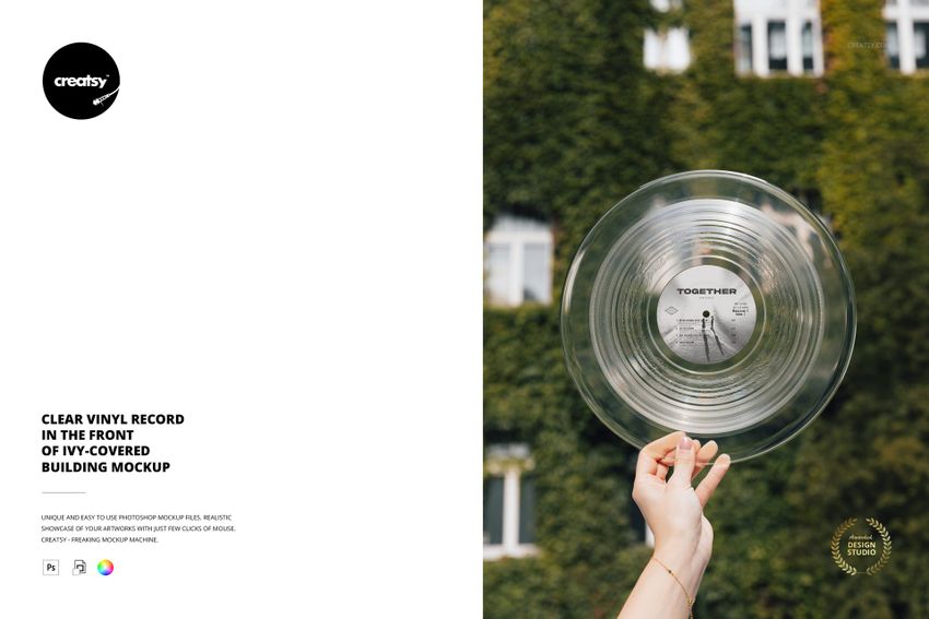 Transparent vinyl record mockup held up against a background of ivy-covered building and windows outdoors.