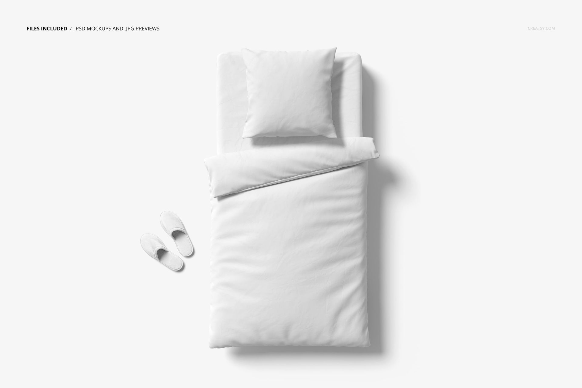 Top view of a white bedding set mockup featuring a duvet and pillow, placed next to a pair of white slippers.