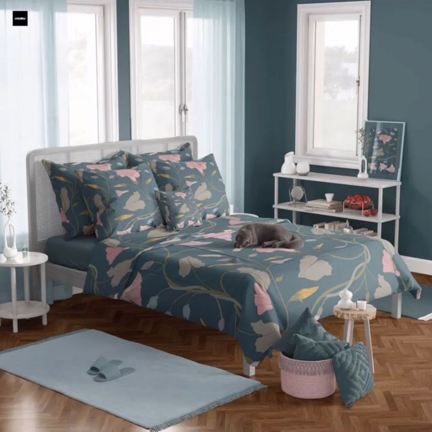 Boho bedroom bedding mockup featuring a bed with floral-patterned duvet and pillows in a teal room with wood flooring.