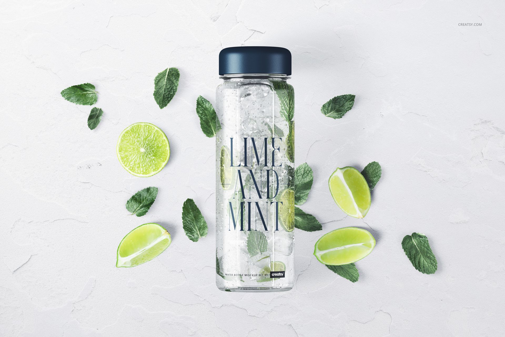 Mockup of a transparent water bottle with ice, lime, and mint, viewed from the top with scattered fresh ingredients.