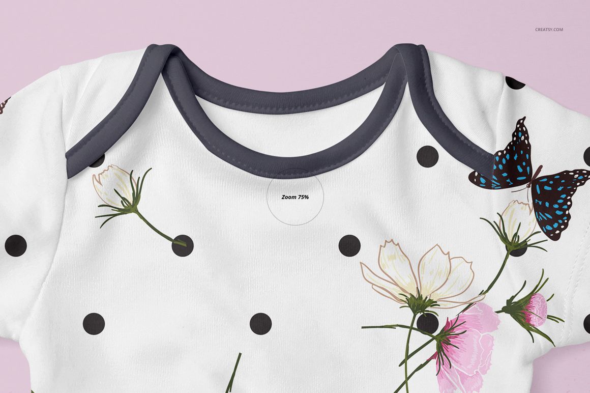 Front view of a baby onesie mockup with black trim, featuring a white background, floral print, black dots, and a blue butterfly.