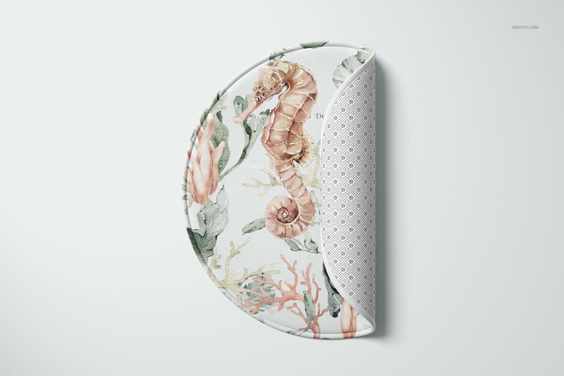 Round polyester bath mat mockup with seahorse and coral pattern, shown from top view with half folded edge.