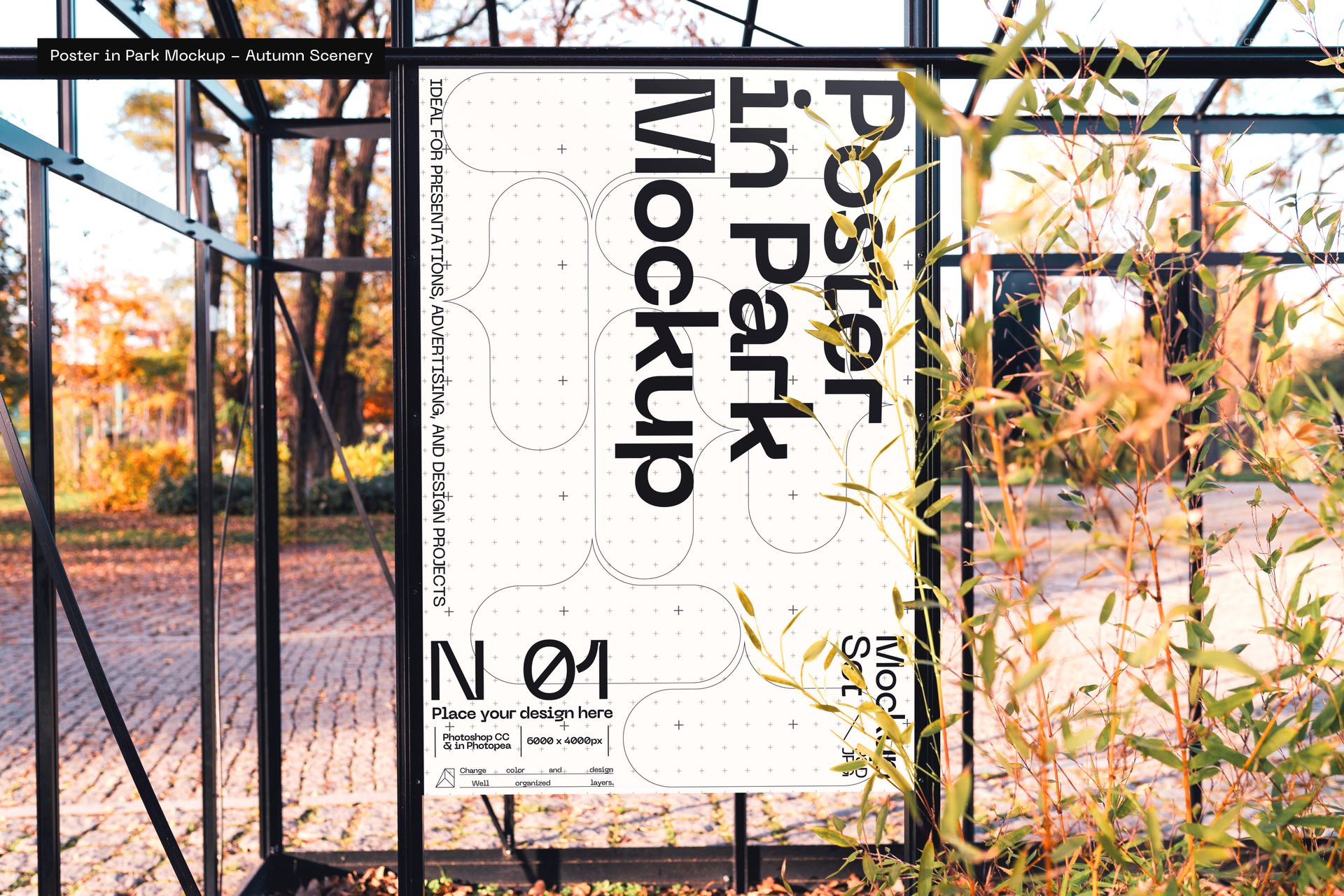 Large rectangular poster mockup displayed outdoors in a metal frame, surrounded by autumn trees and sunlight.