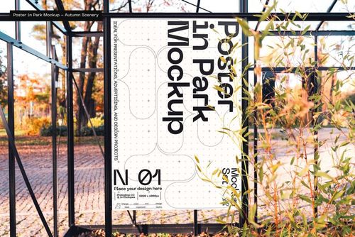 Large rectangular poster mockup displayed outdoors in a metal frame, surrounded by autumn trees and sunlight.