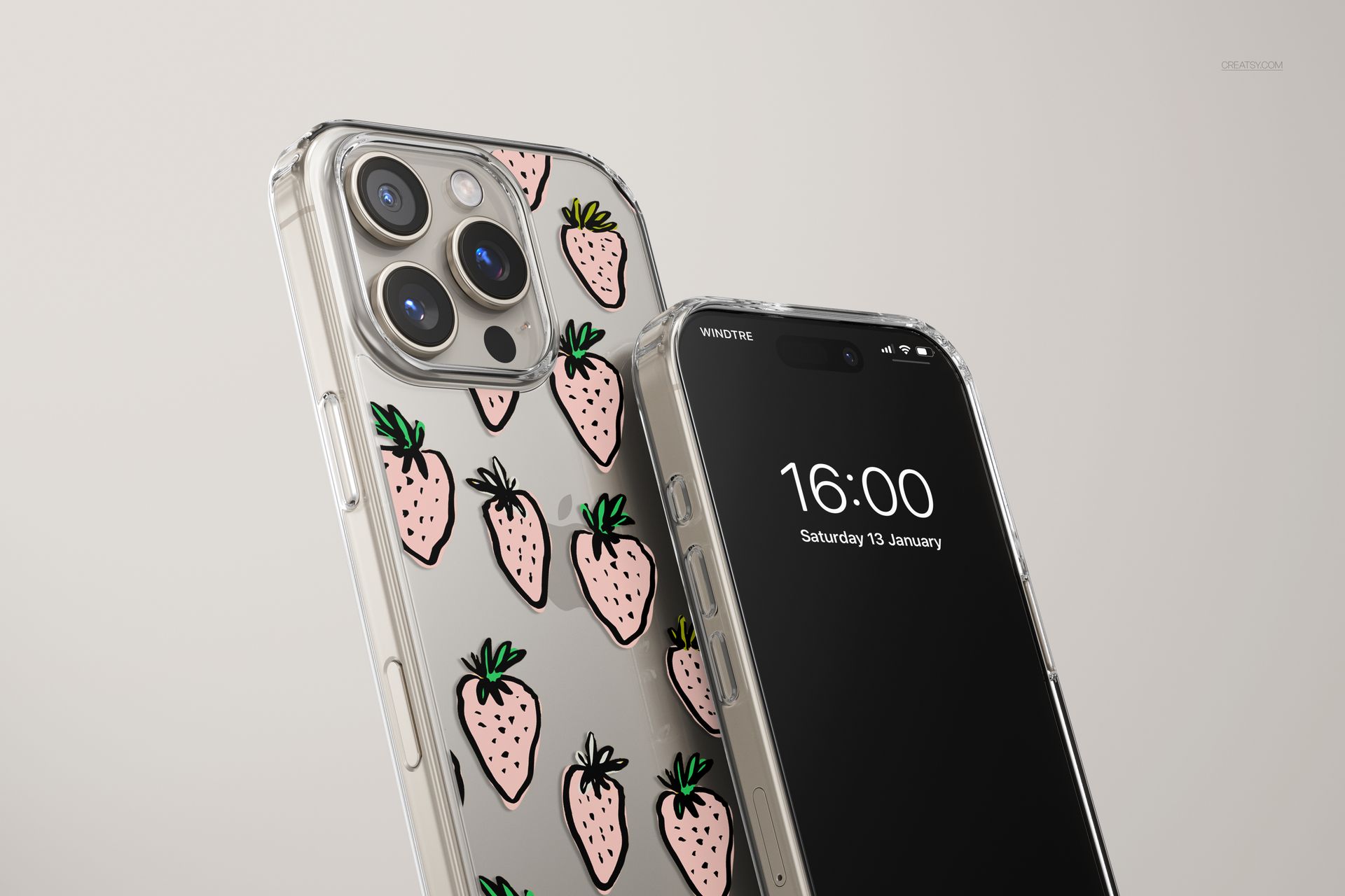 PSD mockup of an iPhone 16 Pro Max with a transparent case featuring hand-drawn pink strawberries, close-up scene.