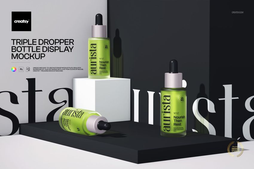 PSD mockup showing three green cosmetic dropper bottles on geometric black and white blocks, front perspective.