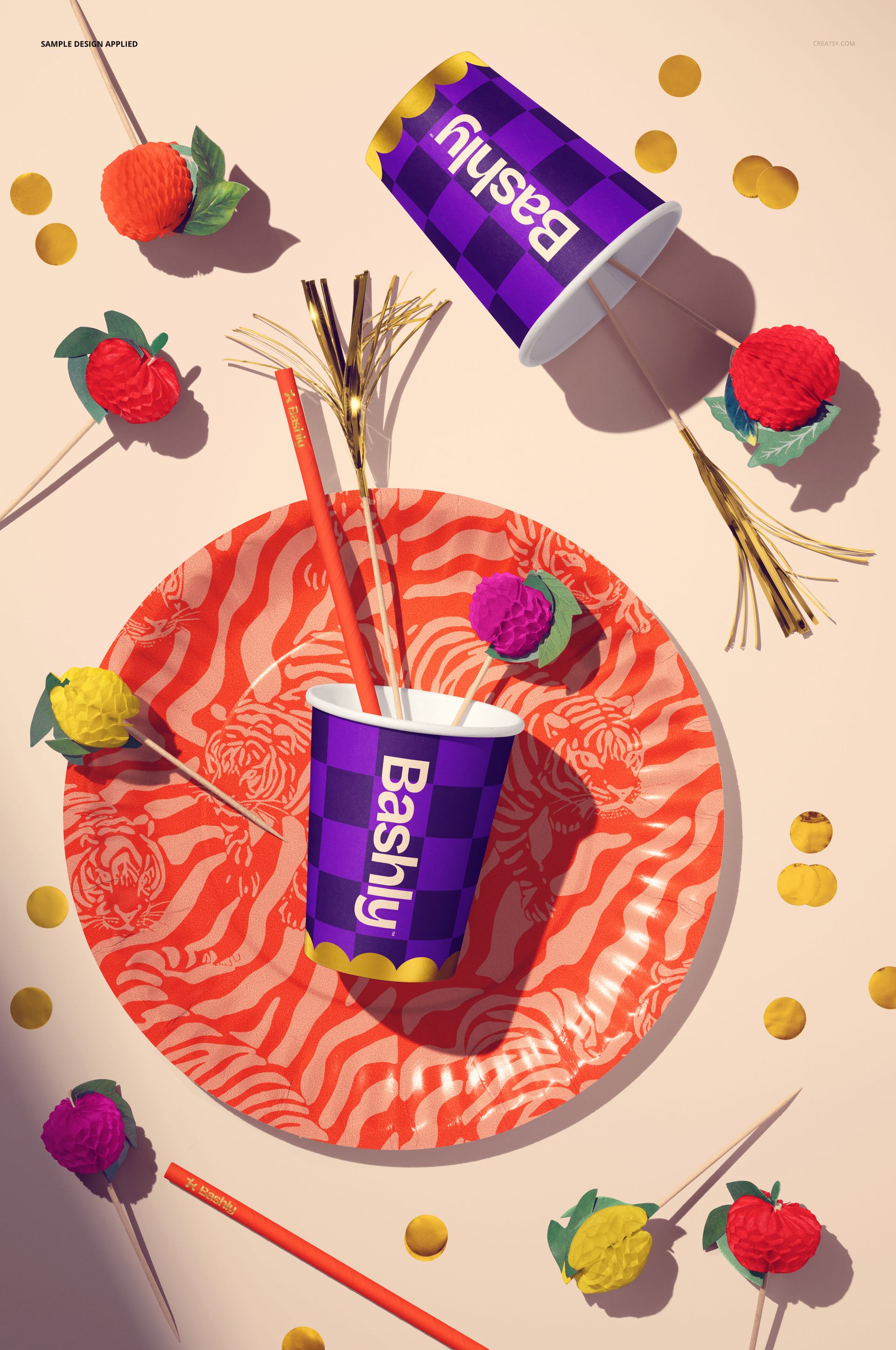 PSD mockup showing a party plate with a vivid animal print and purple checkered cups, arranged with party props.