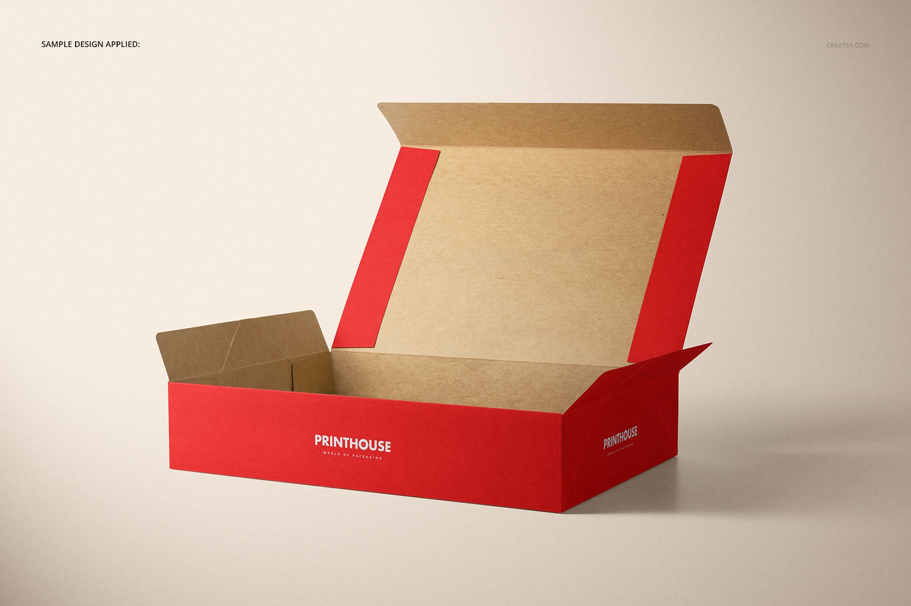 Natural kraft packaging box mockup with red sides and open top, displayed in a simple studio setting.