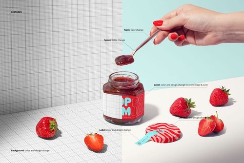 Front view of a strawberry jam jar mockup with a customizable label, surrounded by fresh strawberries and a spoon with jam.