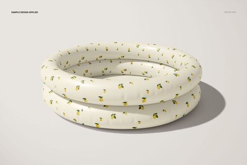 PSD mockup of a circular kids' pool with a white background and repeating lemon motif, viewed from a slightly side angle.