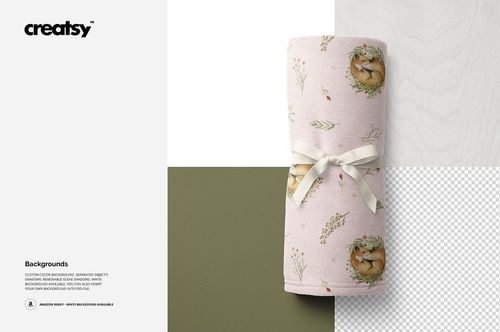 Rolled baby blanket mockup featuring a light pink fabric with subtle animal and floral motifs, shown from a top view.