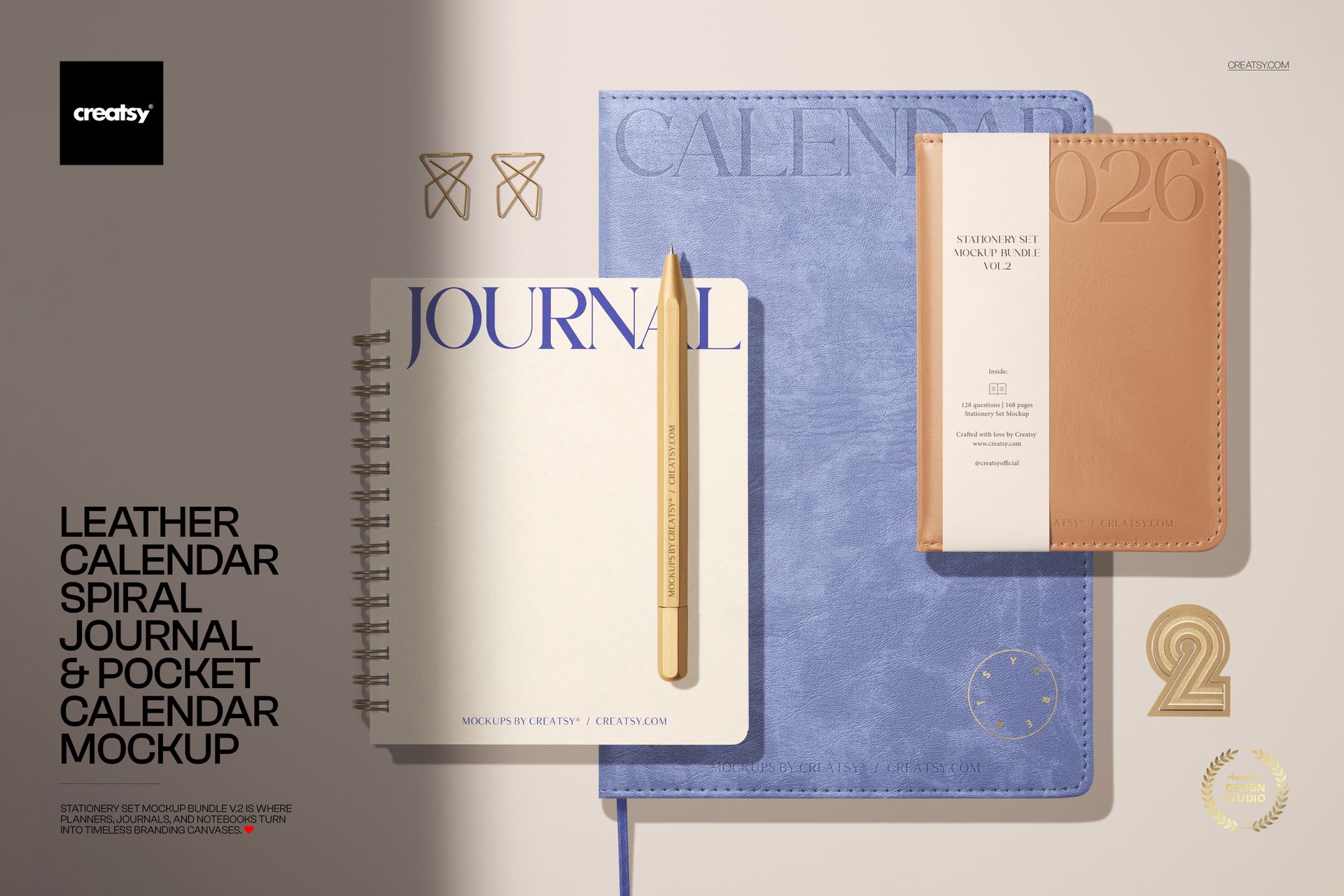 Flat lay of a blue spiral journal and tan leather pocket calendar mockup with a pencil on a beige surface.