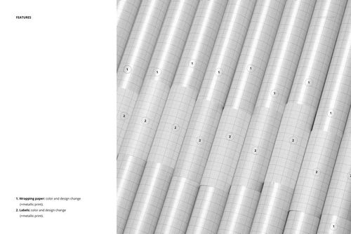 PSD mockup displaying a group of wrapping paper rolls side by side, each marked with a grid pattern and numbers.