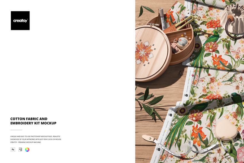 Cotton fabric mockup featuring vibrant orange and green floral design, embroidery kit, and sewing accessories on wood.