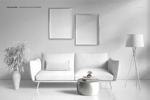 Contemporary interior mockup featuring a white couch, decorative pillow, coffee table, and framed wall art.