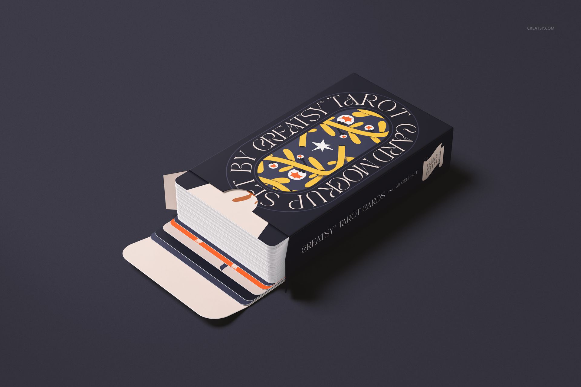 PSD mockup of a tarot card set featuring a navy blue box with ornate yellow and white designs, lid partially open.