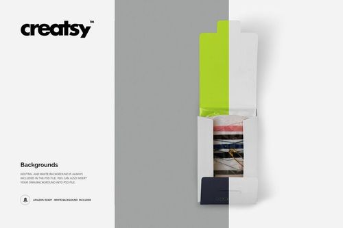 Top view of a sewing kit mockup in an open rectangular box, displaying various sewing supplies against a split gray and white background.