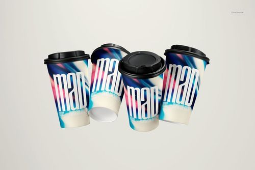 Set of four paper cups with black lids, shown in a PSD mockup, decorated with vibrant abstract patterns and large text.