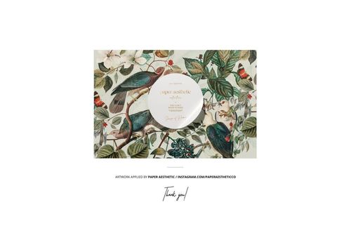 Front view of a grosgrain ribbon mockup featuring a floral and bird pattern in green, red, and cream tones.