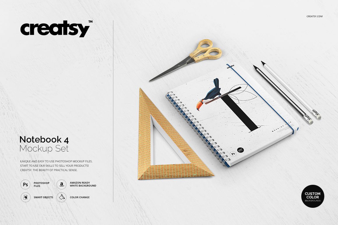 Front view of a notebook mockup with a bird illustration on the cover, placed beside stationery items on a clean background.