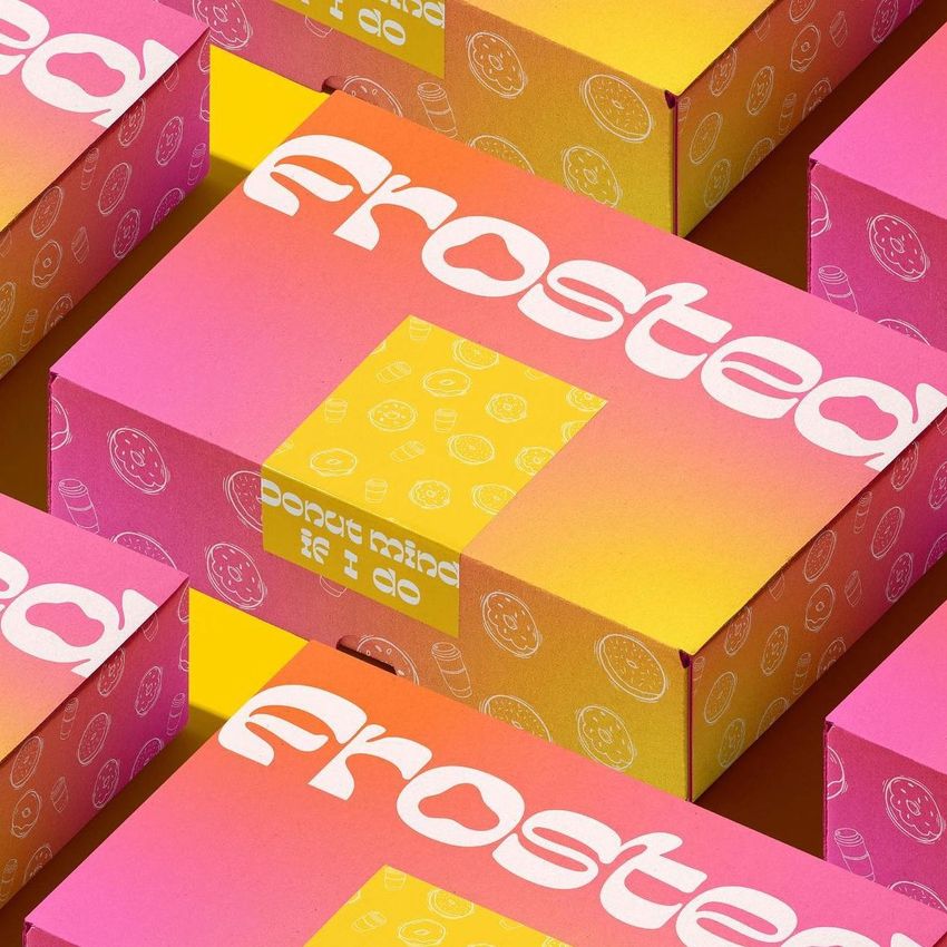 Mailing box mockup with a pink and yellow gradient design, white text, and circular sticker graphics in a repeating pattern.