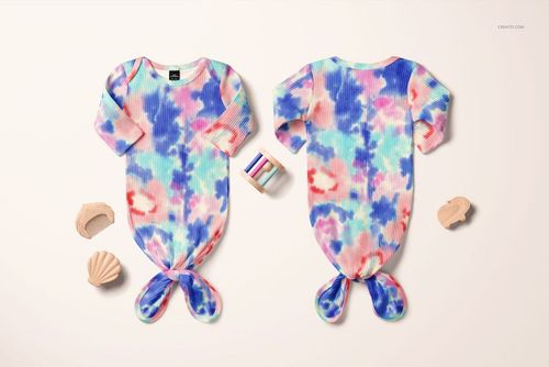 PSD mockup featuring a pair of ribbed baby gowns with knotted ends, vivid multicolor design, and playful accessories.